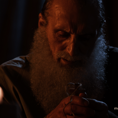 John Wycliffe (Jared Morgan) prays in his cell